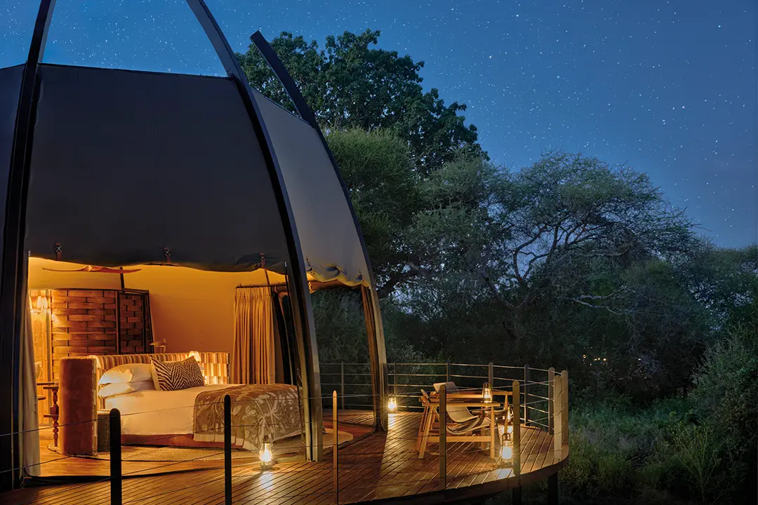 Tarangire Camp canvas tent exterior, raised wooden deck and open bush views in Tarangire National Park